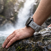 Deadtree Summit strap at a waterfall